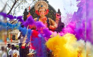 Colorful Ganpati Utsav idol decorated with flowers